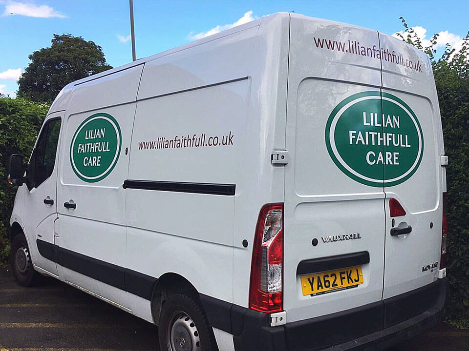 Van wrapped in company logo